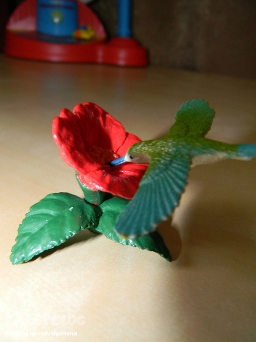 Фигурки птиц...