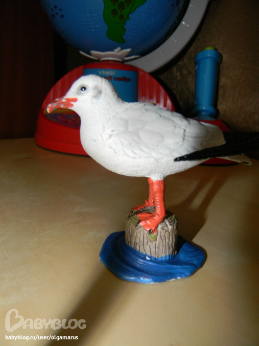 Фигурки птиц...